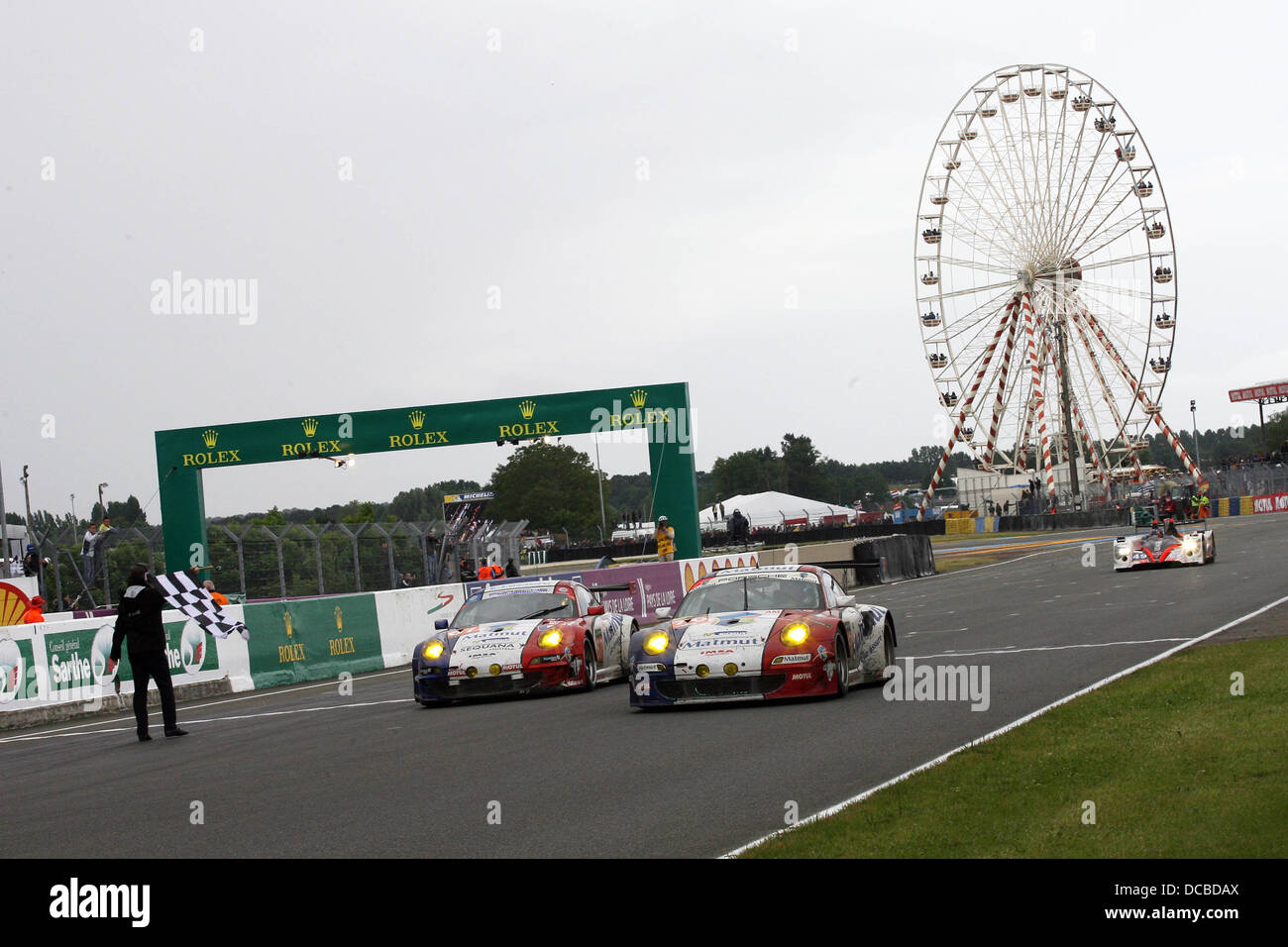 Porsche finish in formation at the 2013 Le Mans 24 Hours. Stock Photo
