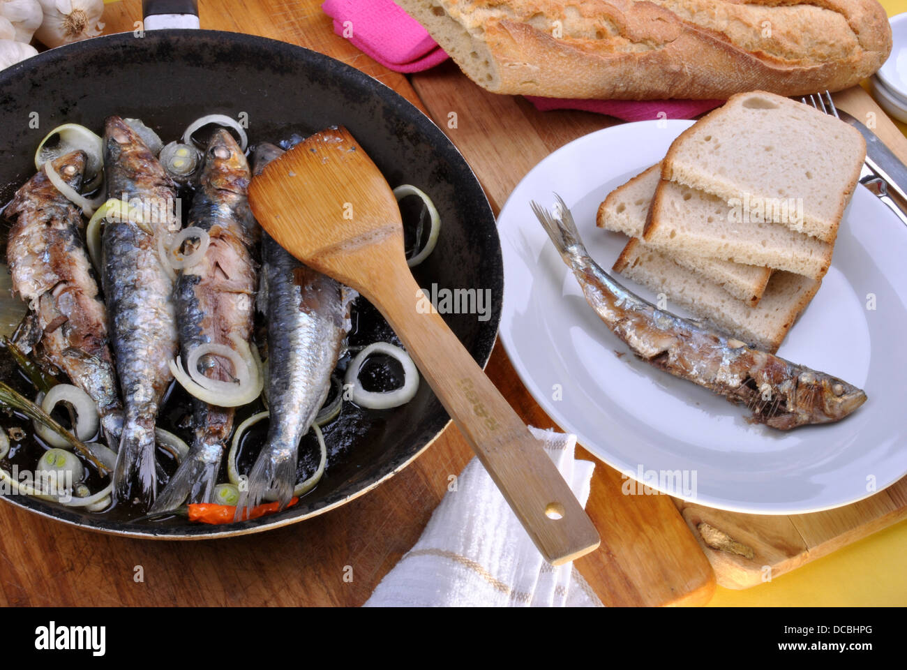grilled sardine in a pan ready to eat Stock Photo Alamy