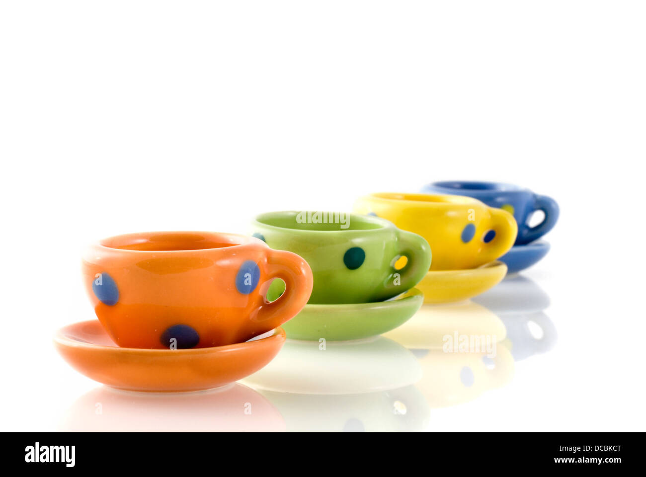 a row of colorful cups Stock Photo