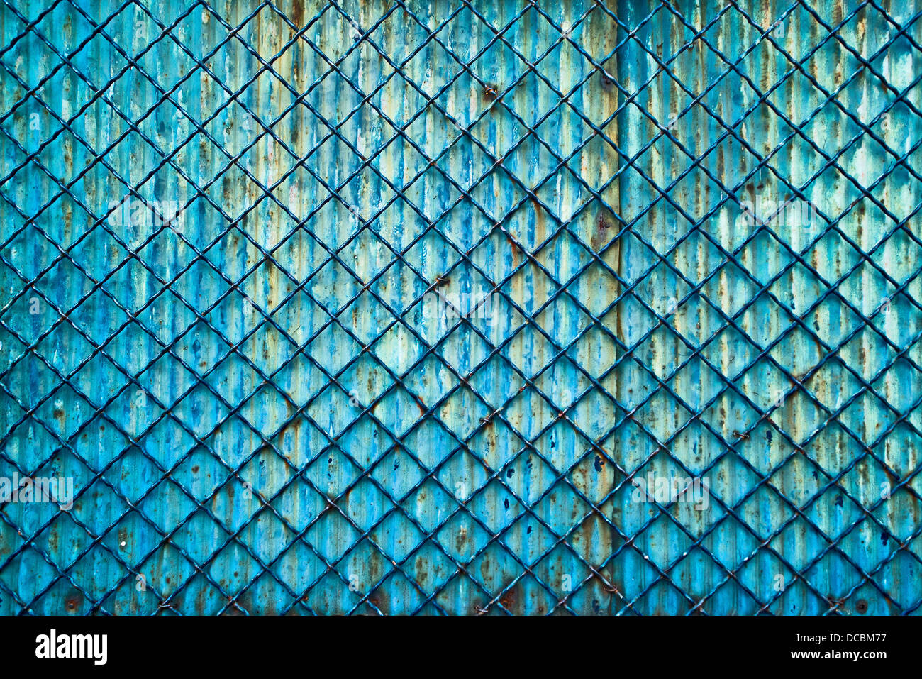 Metal grid fence as old grunge background Stock Photo