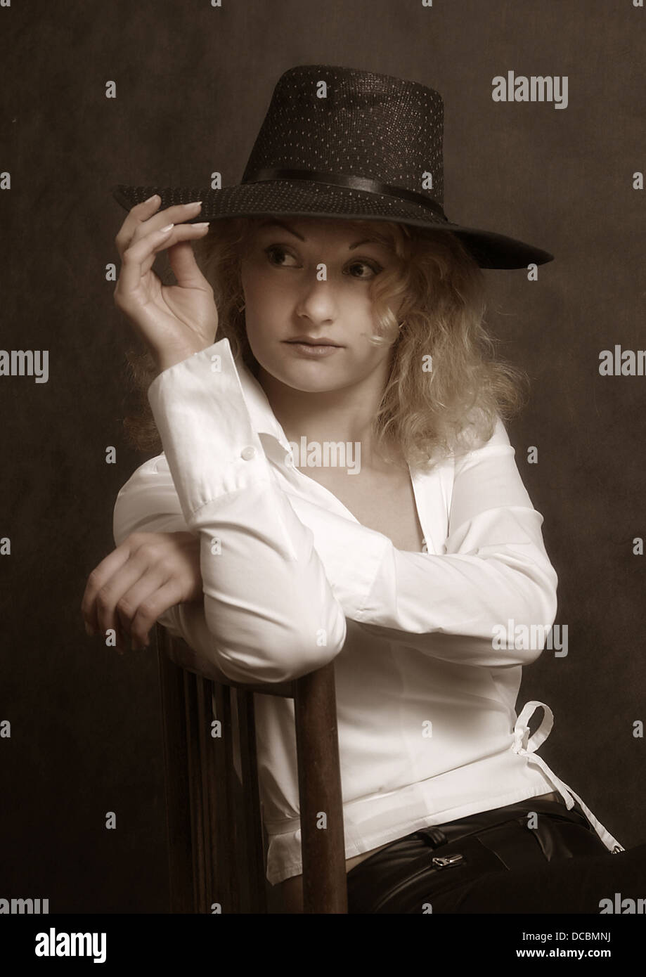 The beautiful girl in a hat Stock Photo - Alamy