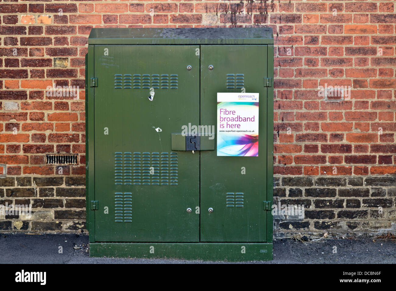 BT Openreach fibre broadband green street cabinet, seen in St Ives, Cambridgeshire, England Stock Photo