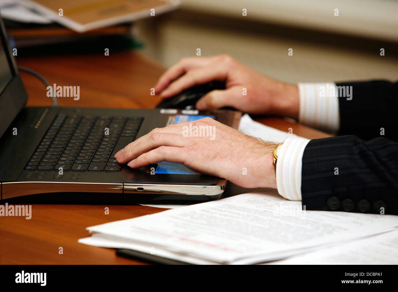 Working on computer Stock Photo - Alamy