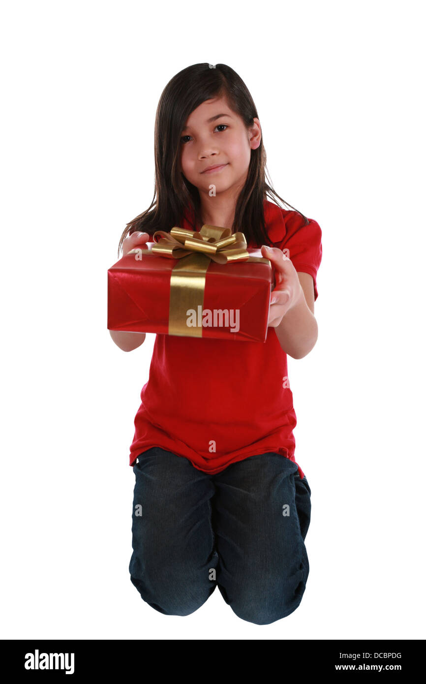 Little girl holding present Stock Photo - Alamy