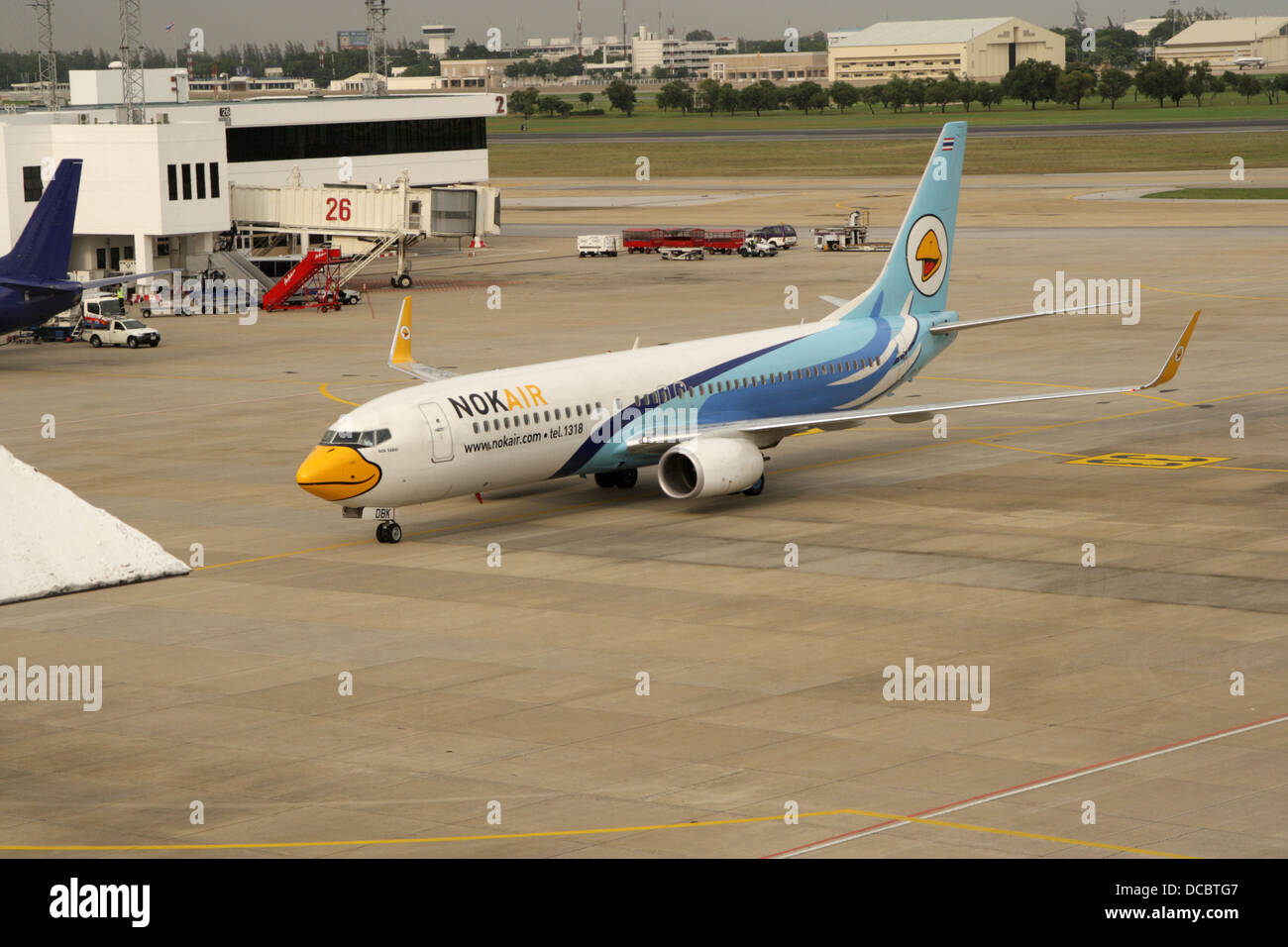 Low cost airline Nok Air parking at Don Muang airport Stock Photo