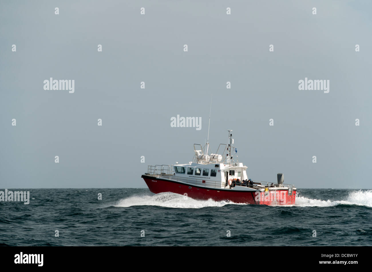 A tourist boat in the Atlantic heading for the St Kilda archipeligo, Outer Hebrides, Scotland, UK Stock Photo