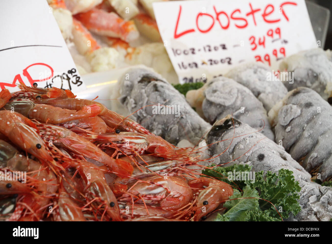 Lobster and shrimp for sale at market. Stock Photo