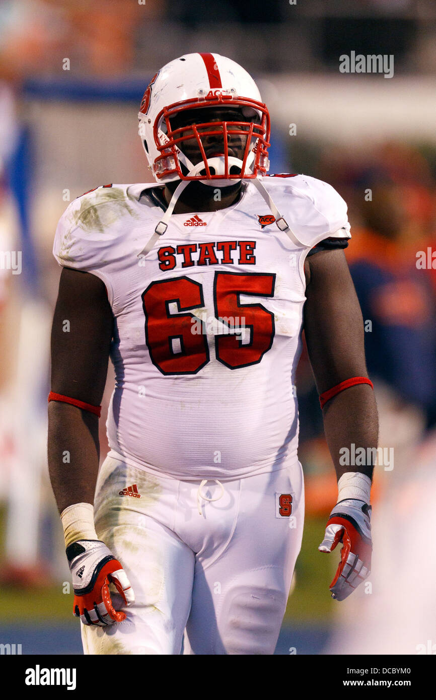 North Carolina State Wolfpack defensive end A.J. Ferguson (65) on the sidelines against the Virginia Cavaliers during the fourth Stock Photo