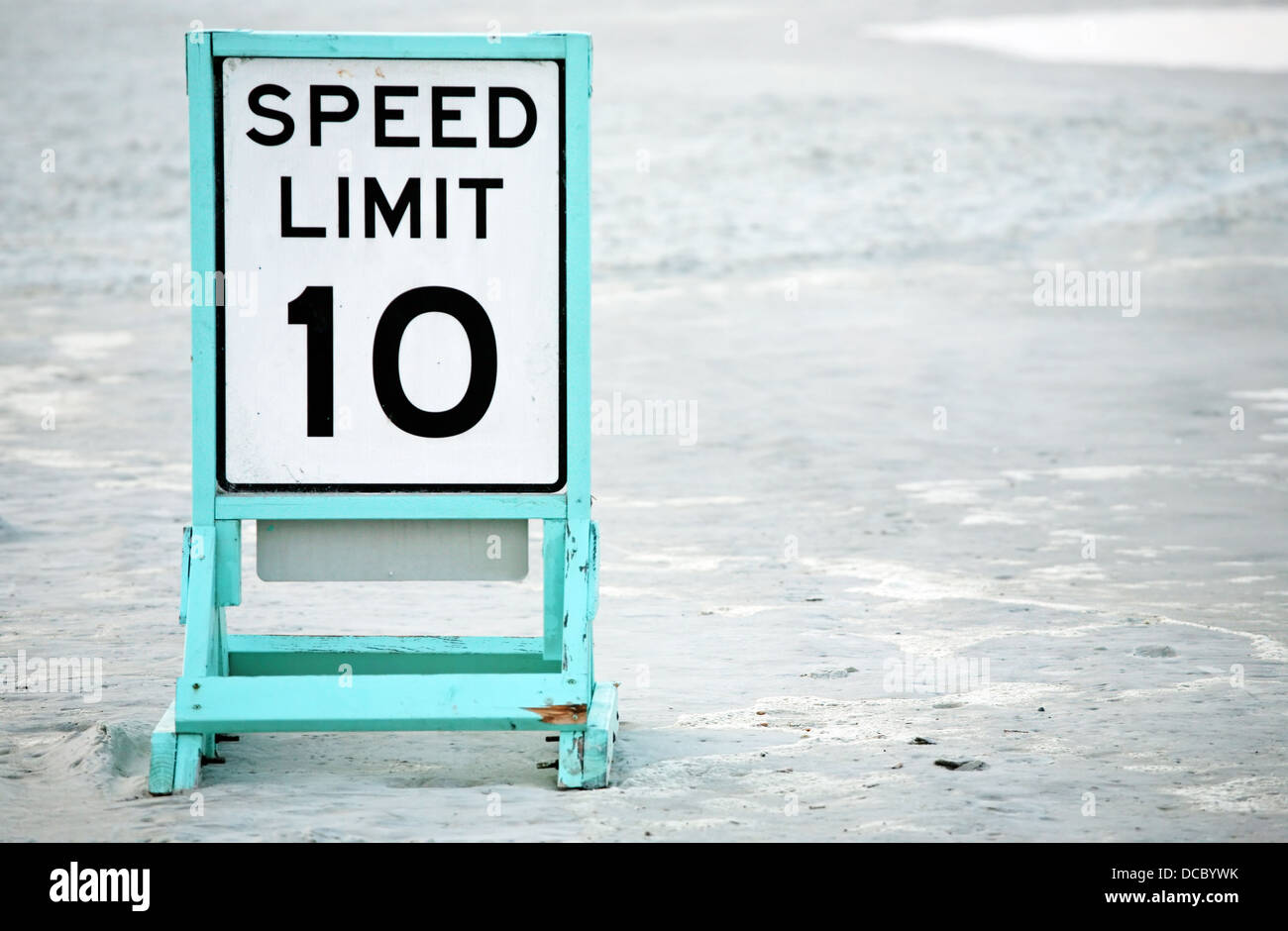 Posted speed limit on beach Stock Photo Alamy