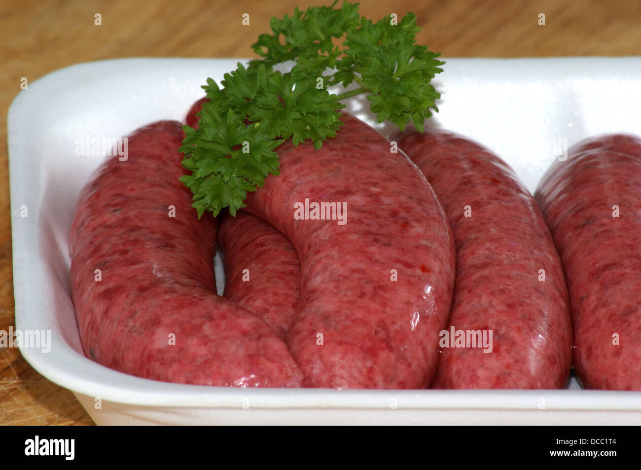 beef sausages in a white styrofoam container Stock Photo Alamy