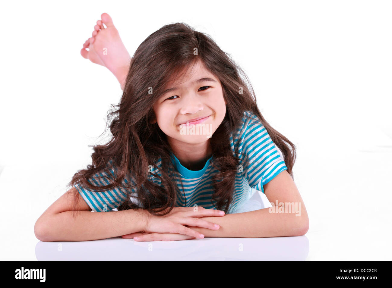 Beautiful little girl lying on floor Stock Photo Alamy