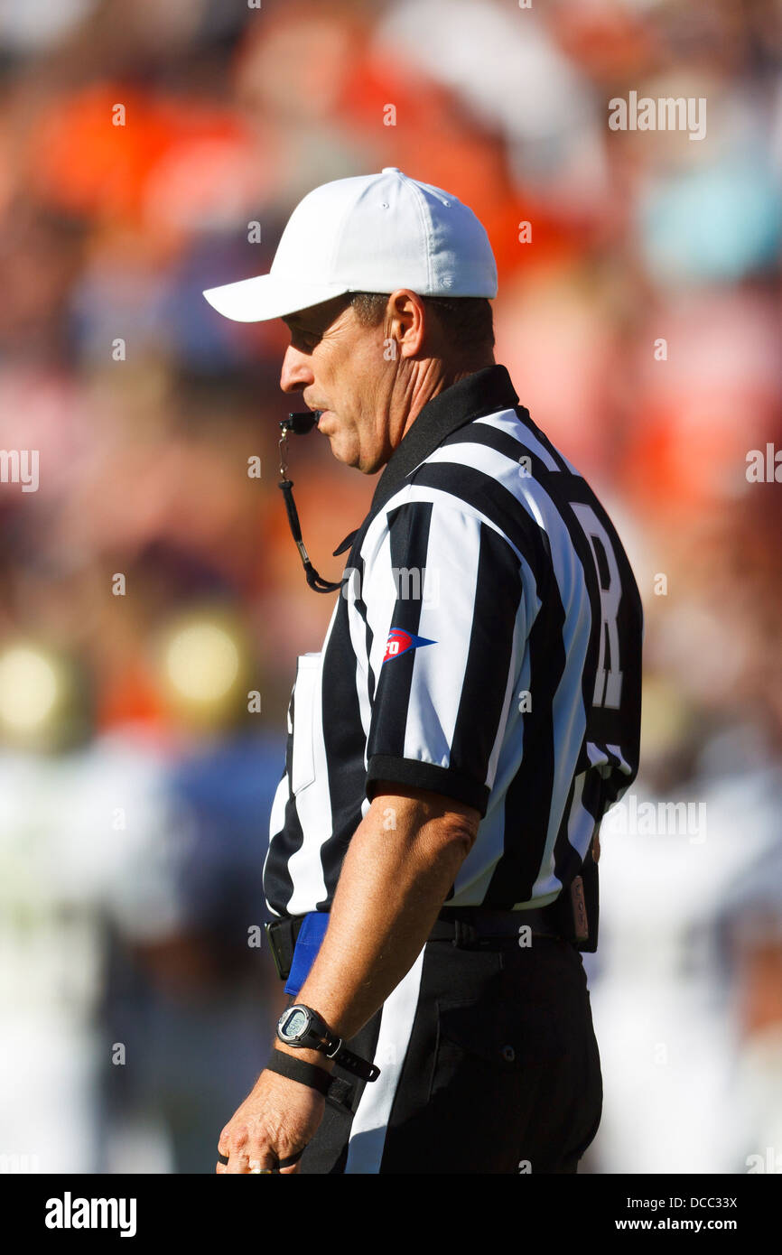 NCAA referee David Epperley with a whistle in this mouth during the second quarter between the Virginia Cavaliers and the Georgi Stock Photo