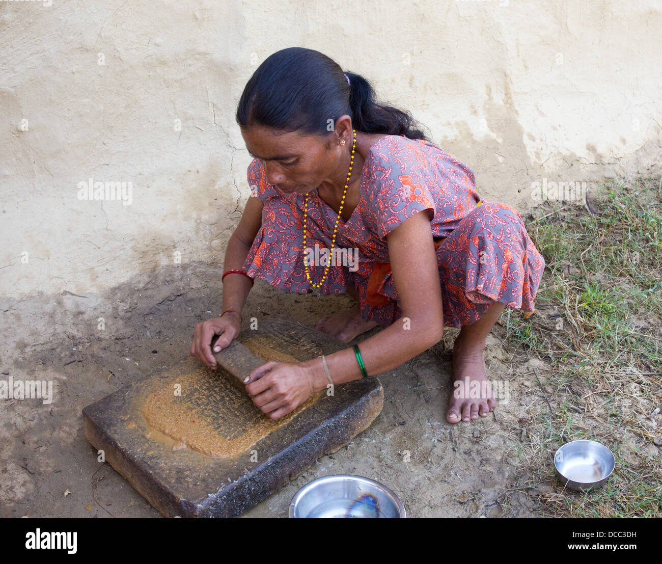 Woman grinding spices hires stock photography and images Alamy