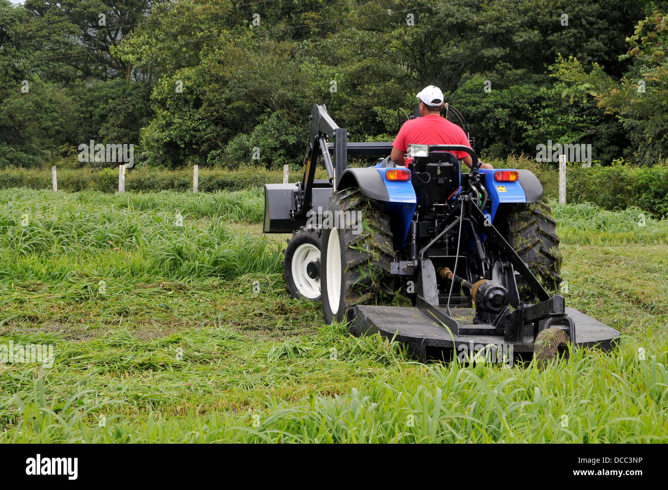 Black man driving tractor hi-res stock photography and images - Alamy