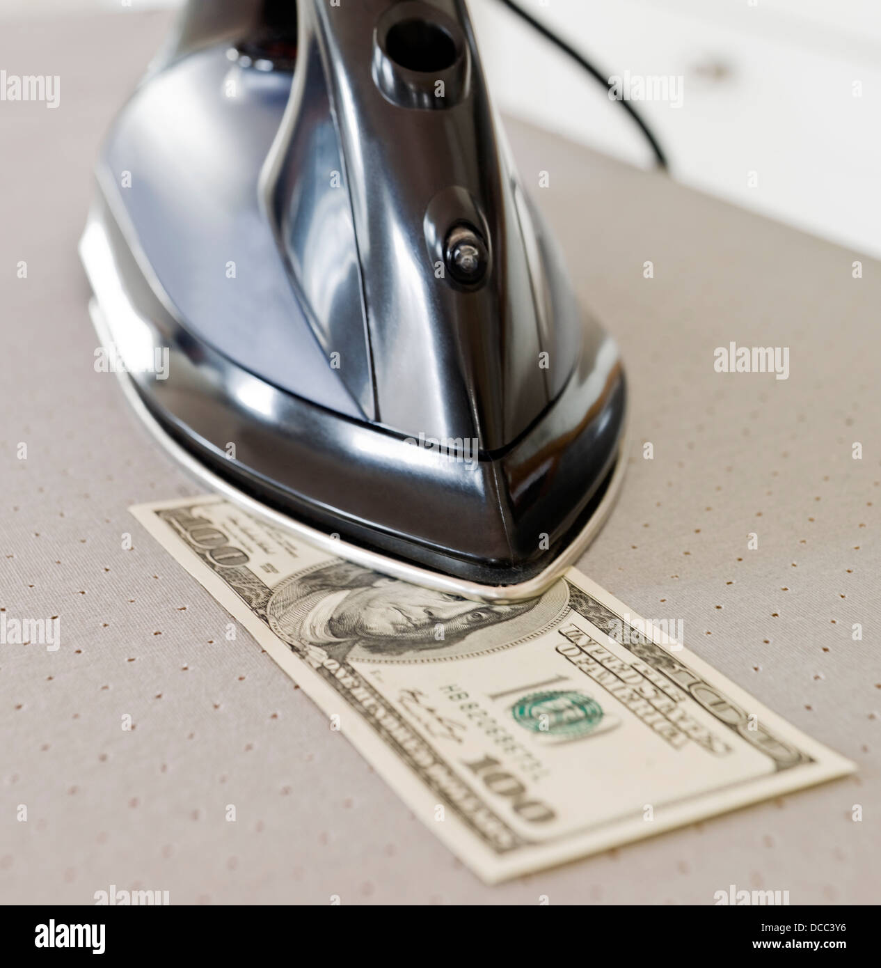 Ironing money hires stock photography and images Alamy