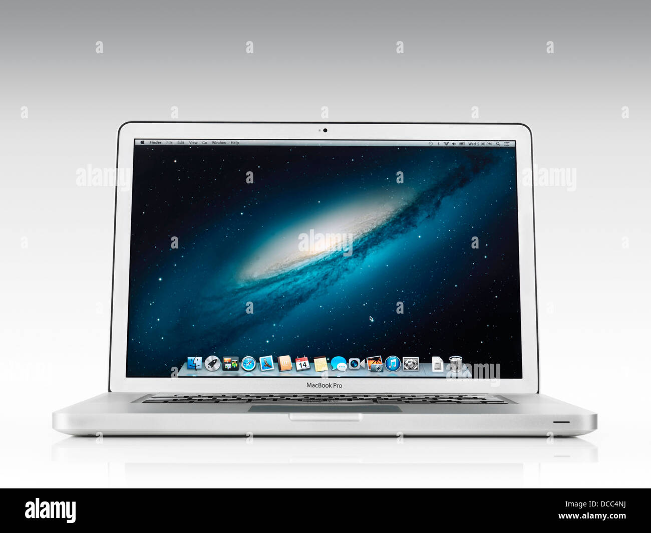Apple Macbook Pro laptop computer front view with desktop on its display isolated on white background with clipping path Stock Photo