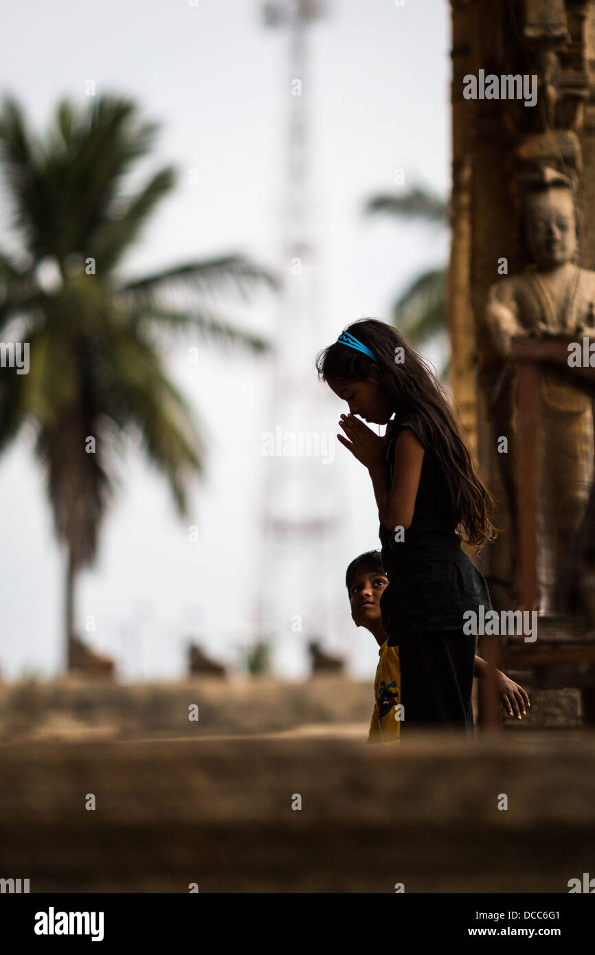 Hindu prayer in the ancient temple Stock Photo - Alamy