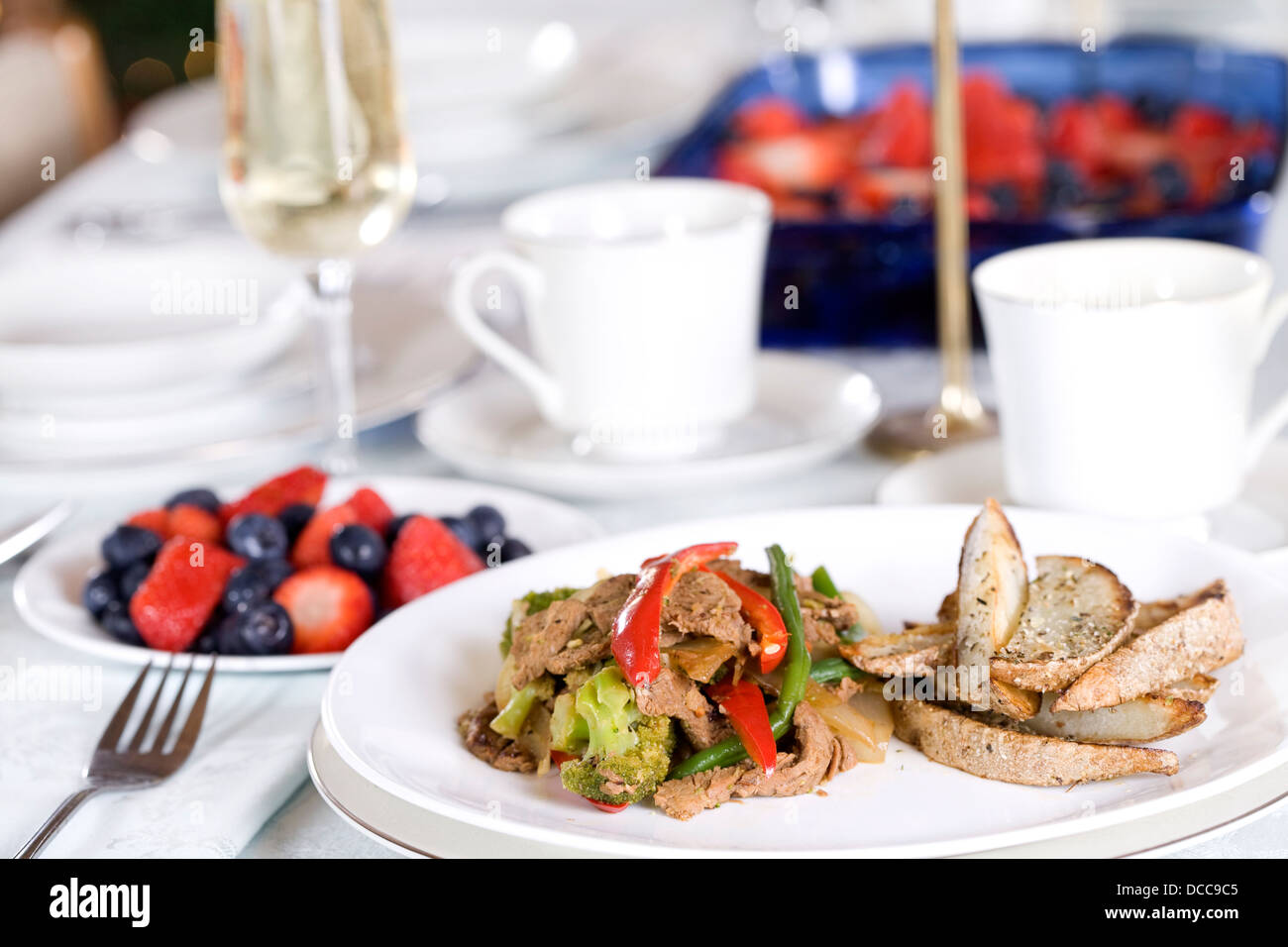 Beef and broccoli stirfry on table Stock Photo