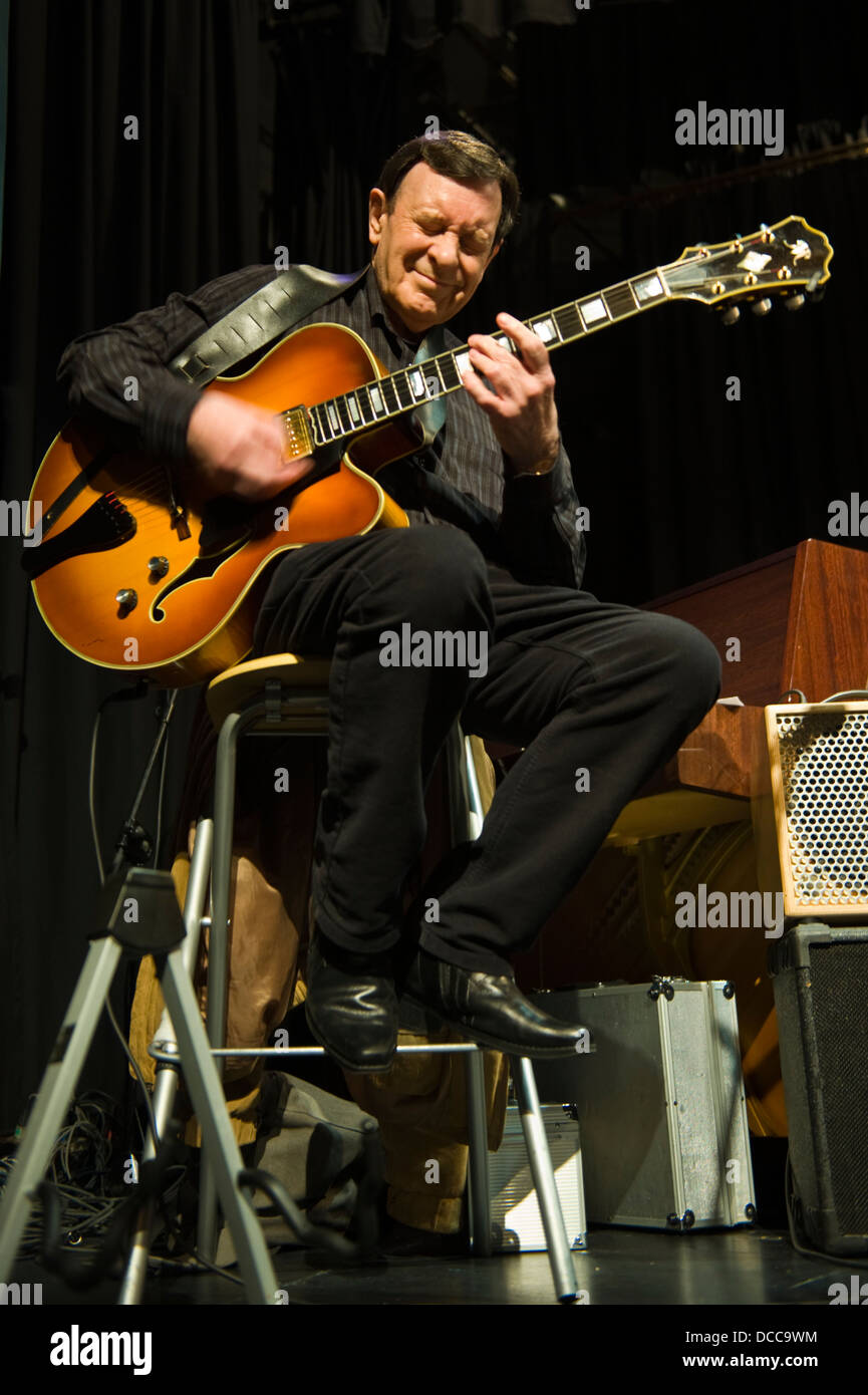 Guitarist with Shades of Shearing Quartet playing on stage at Brecon