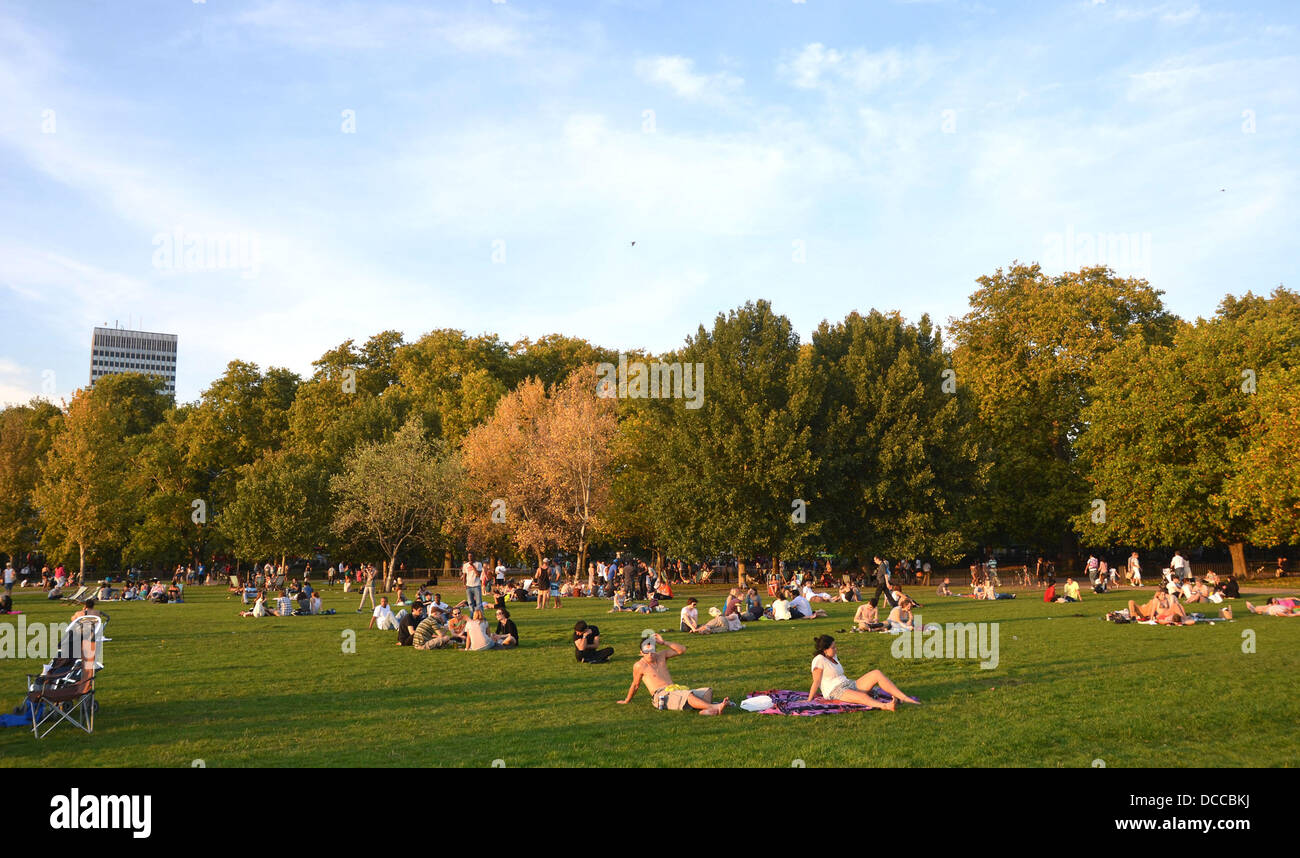 Atmosphere People in Hyde Park make the most of the UK's 'Indian Summer'  where temperatures have reached up to 30c (86f) London, England - 01.10.11  Stock Photo - Alamy