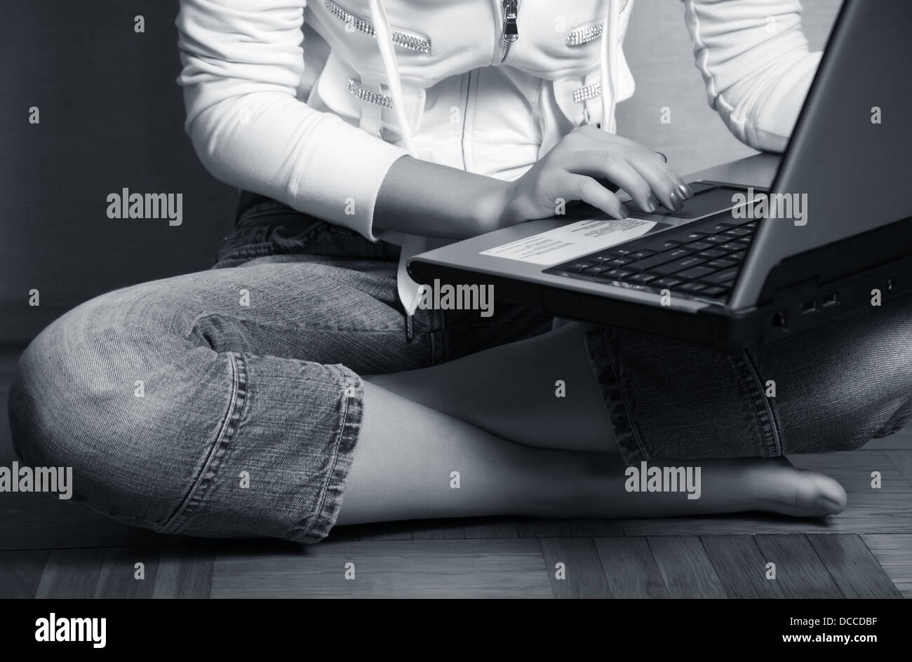 Girl with a computer Stock Photo - Alamy
