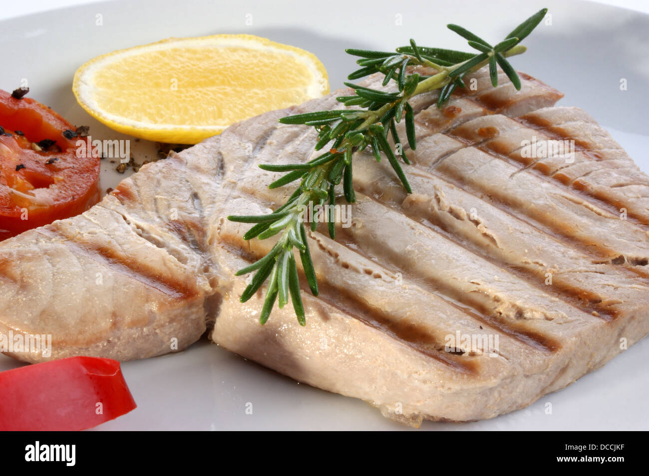 tuna steak with red paprika and lemon Stock Photo Alamy