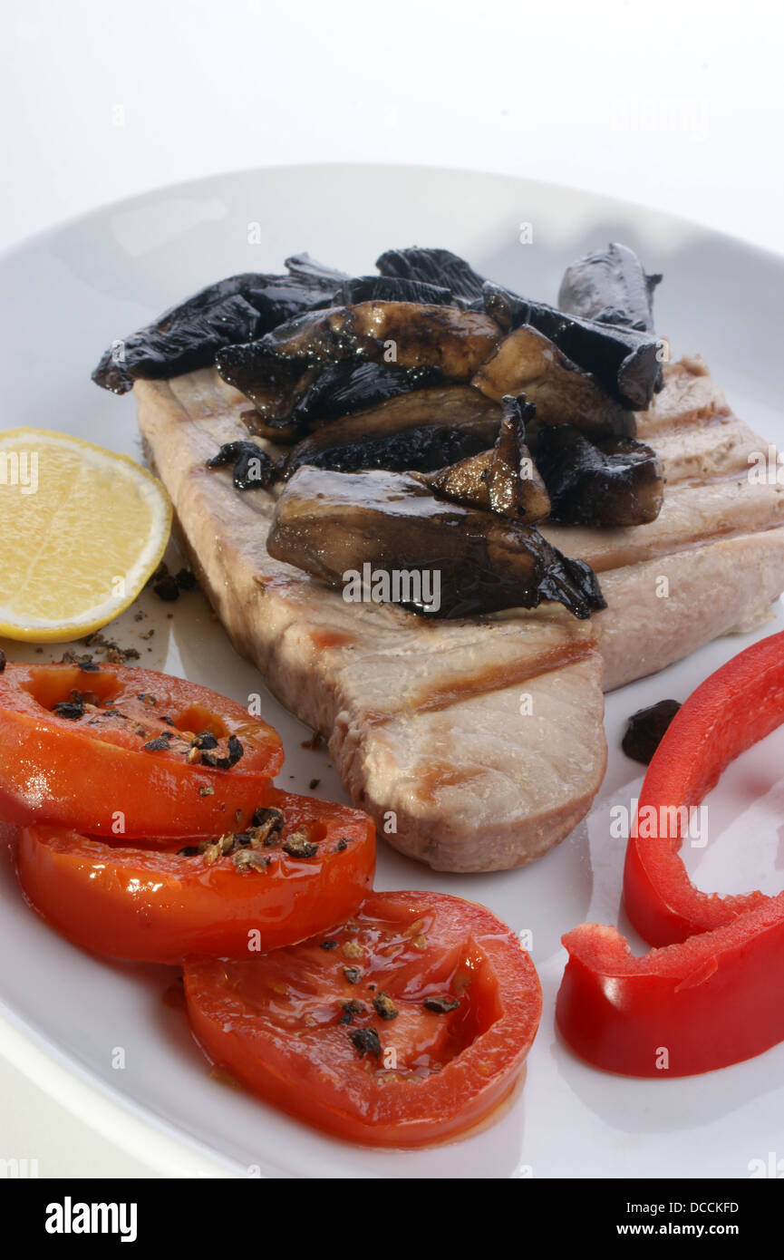 tuna steak with red paprika and tomato Stock Photo Alamy