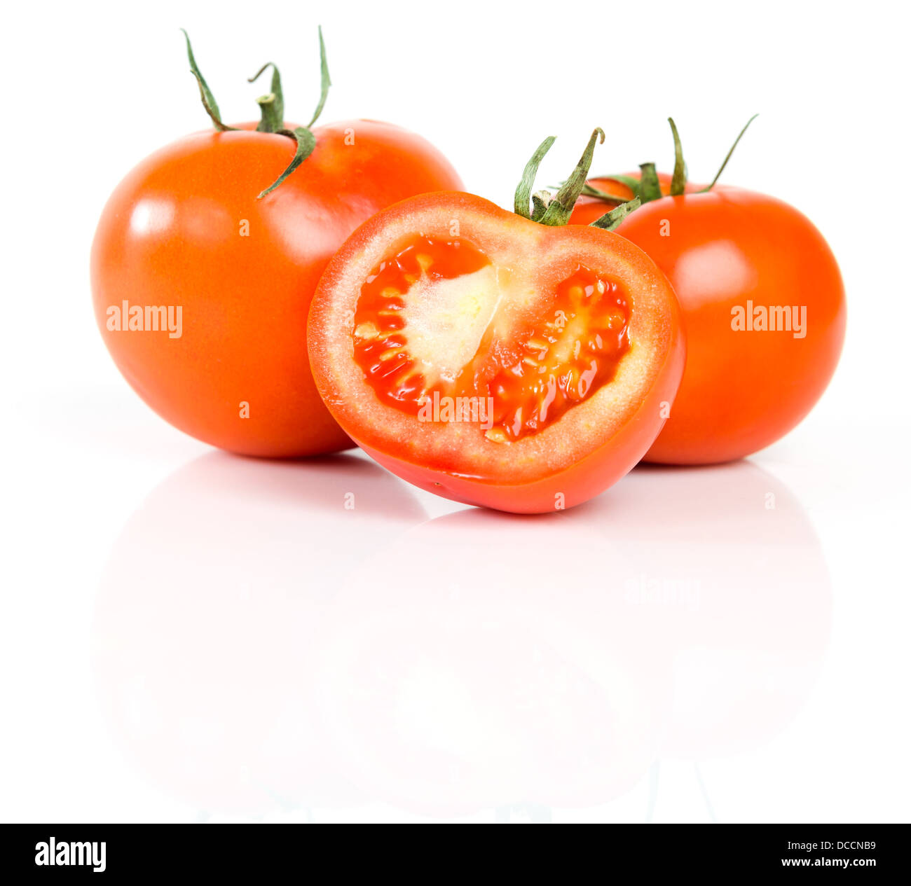 Red Tomatoes on white background Stock Photo - Alamy