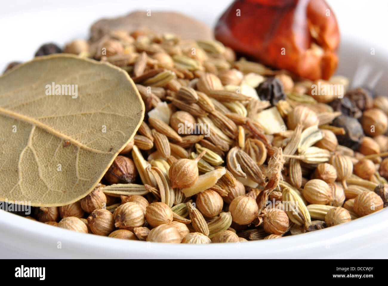 indian spice mix in a white bowl Stock Photo Alamy