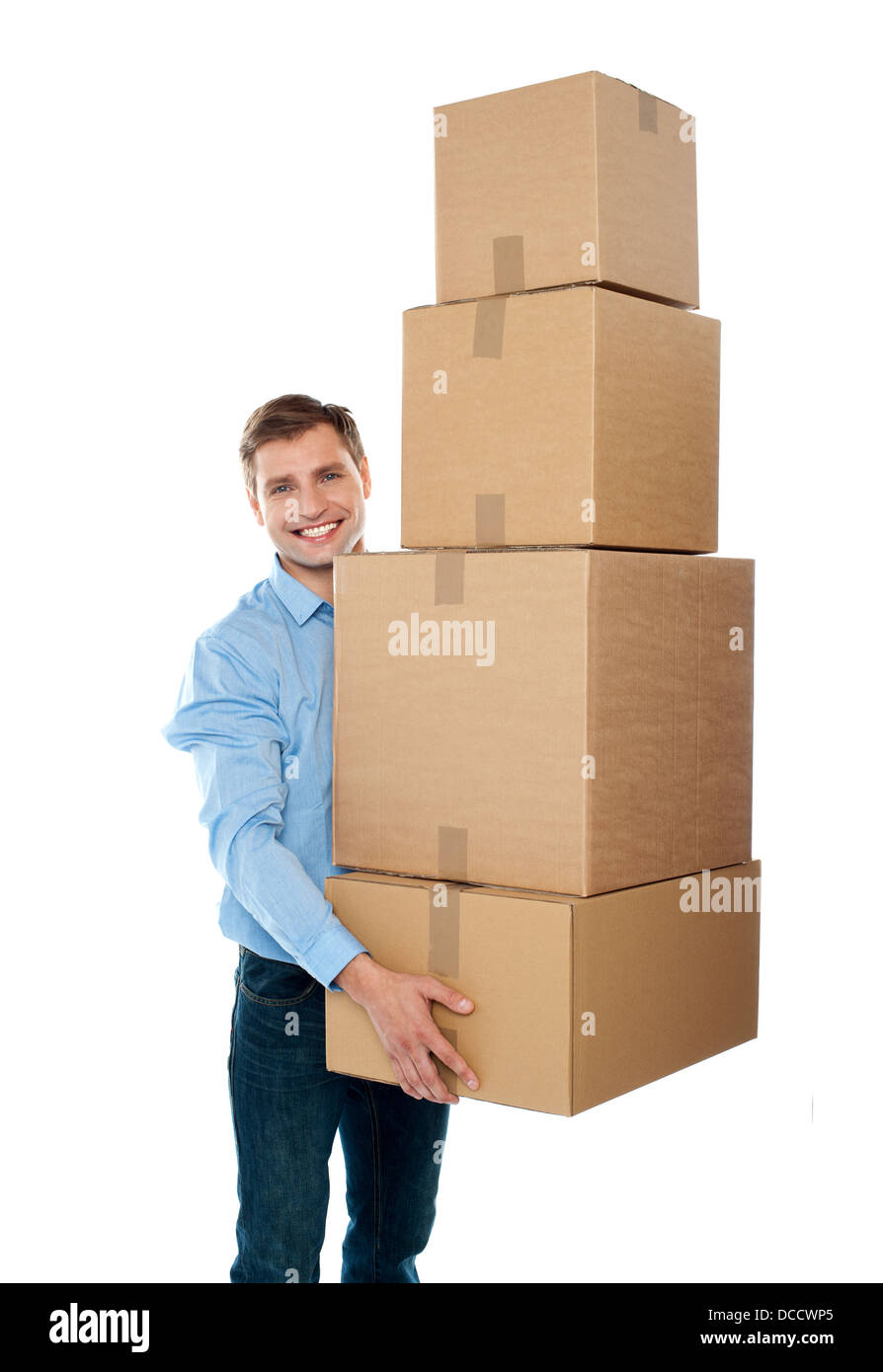 Handsome male with with stack of boxes isolated on white Stock Photo ...