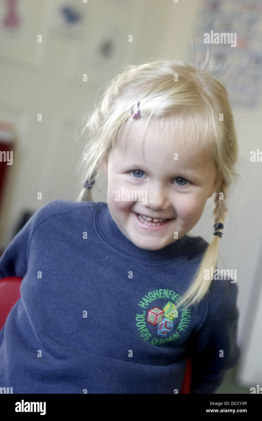 3 year old boy smiling into camera at nursery, holding a cup of milk, Stock  Photo, Picture And Rights Managed Image. Pic. J47-527683