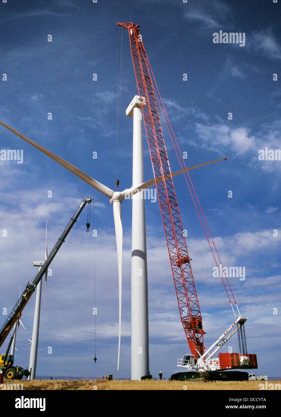 Large crane lifting rotor for wind turbine at Klondike Wind Power Stock