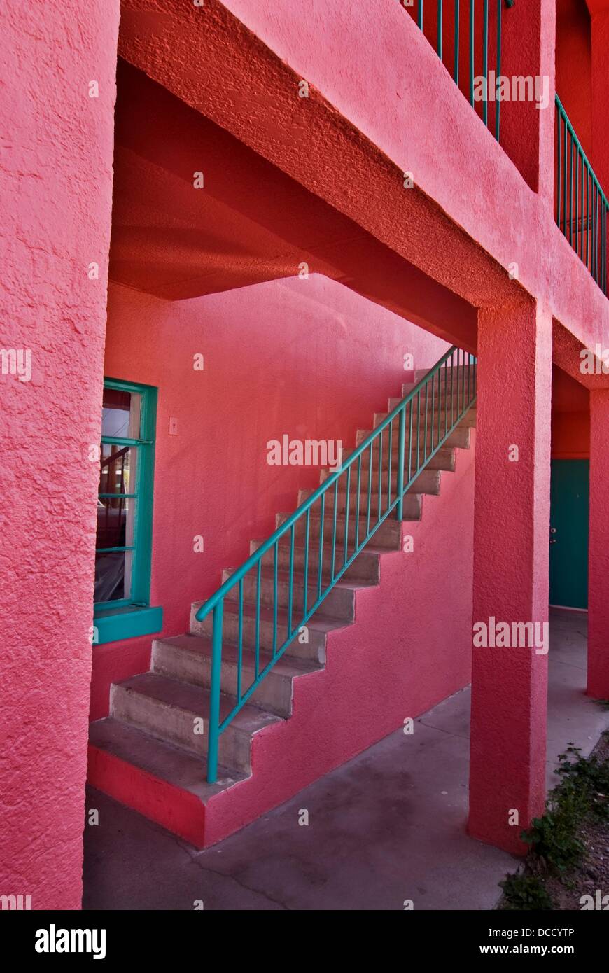 Stairway at brightly colored partment building, Truth or Consequences, New Mexico, USA Stock Photo