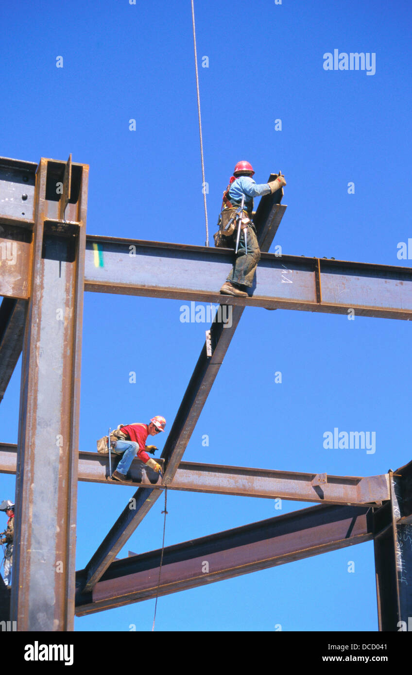 Ironworkers hanging structural steel Stock Photo Alamy