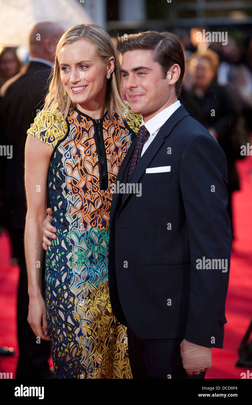 Actors Taylor Schilling and Zac Efron attend ‘The Lucky One