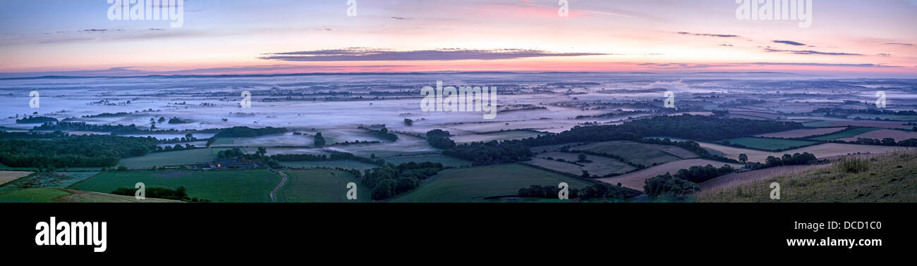 Sussex Weald, UK. 14th August 2013. The Weald of Sussex Before Sunrise on a Summers Morning with Mist Credit:  Timothy Smith/Alamy Live News Stock Photo