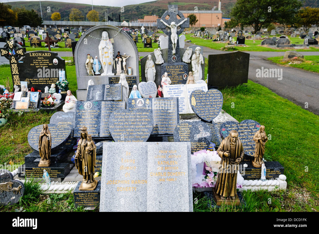 A considerable number of ornaments and memorials on a family grave Stock Photo