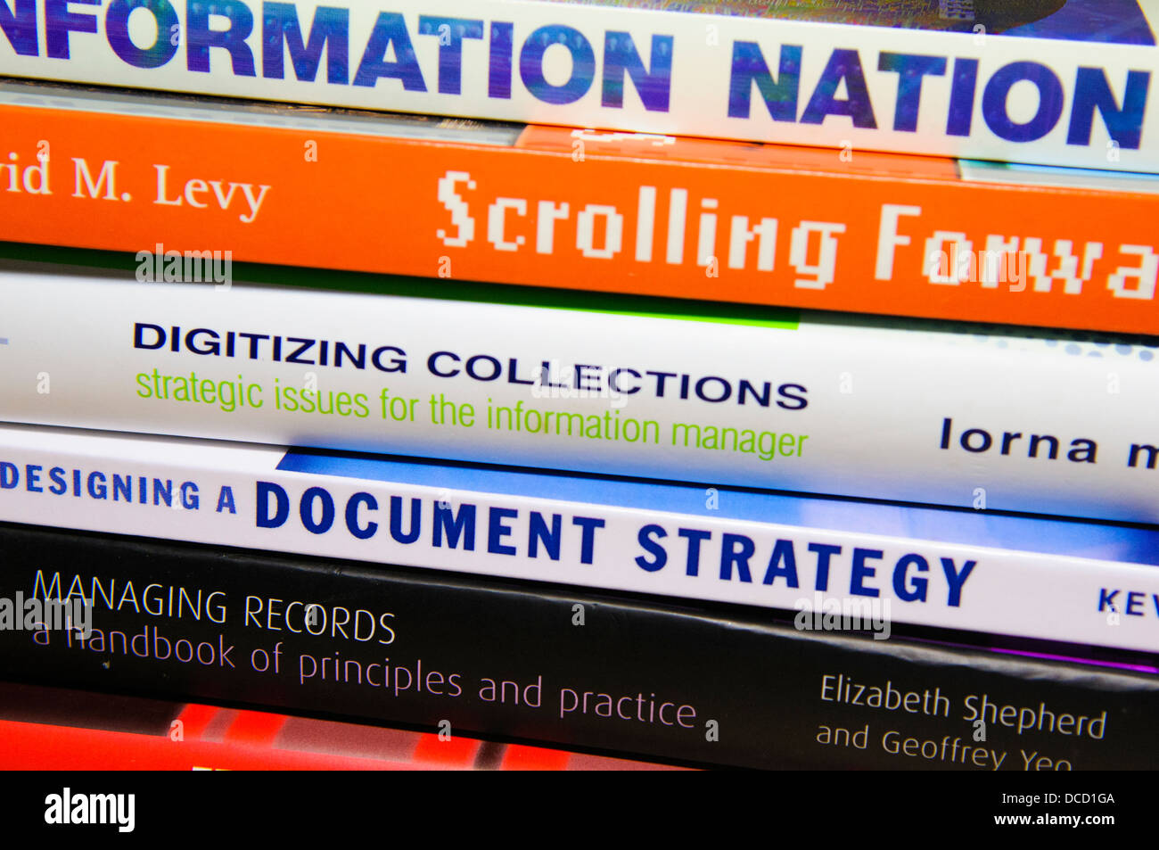 Stack of books on Electronic Document and Records Management Systems (EDRMS) and Information Management Stock Photo