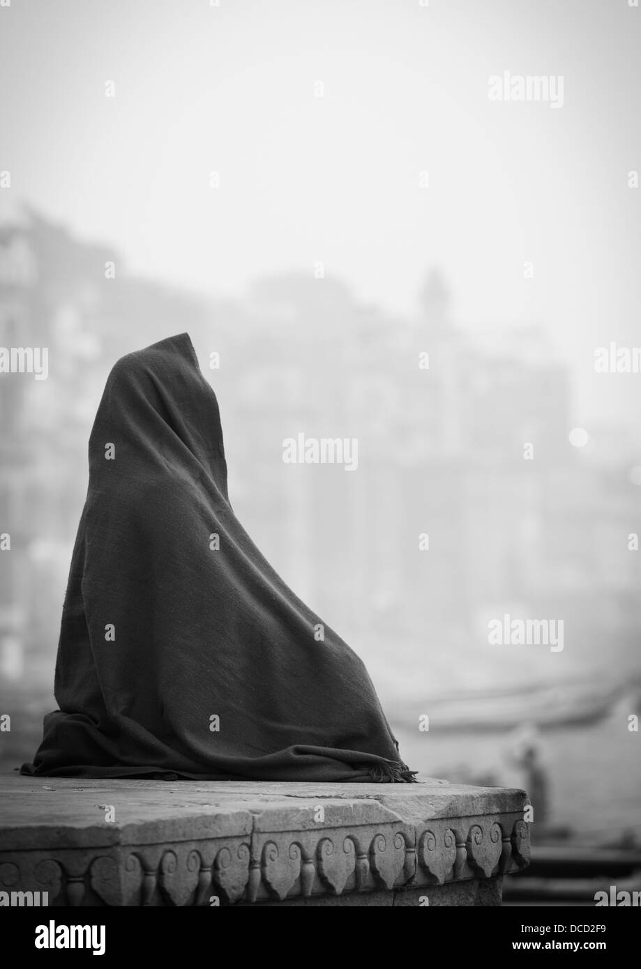 Sadhu Meditating Over River Ganges, Varanasi, India Stock Photo