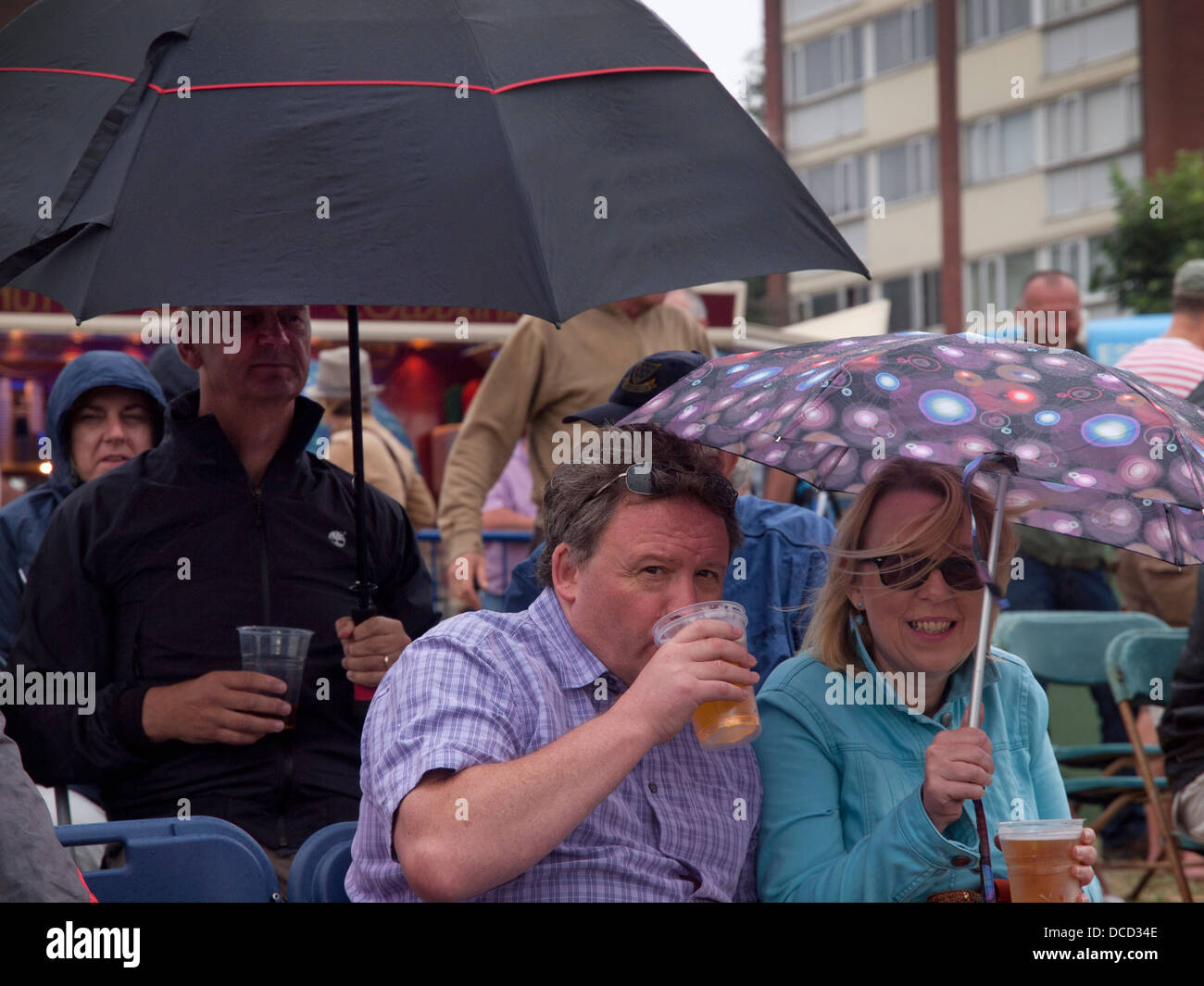 Umbrellas out during a wet day at Sussex Cricket Stock Photo Alamy