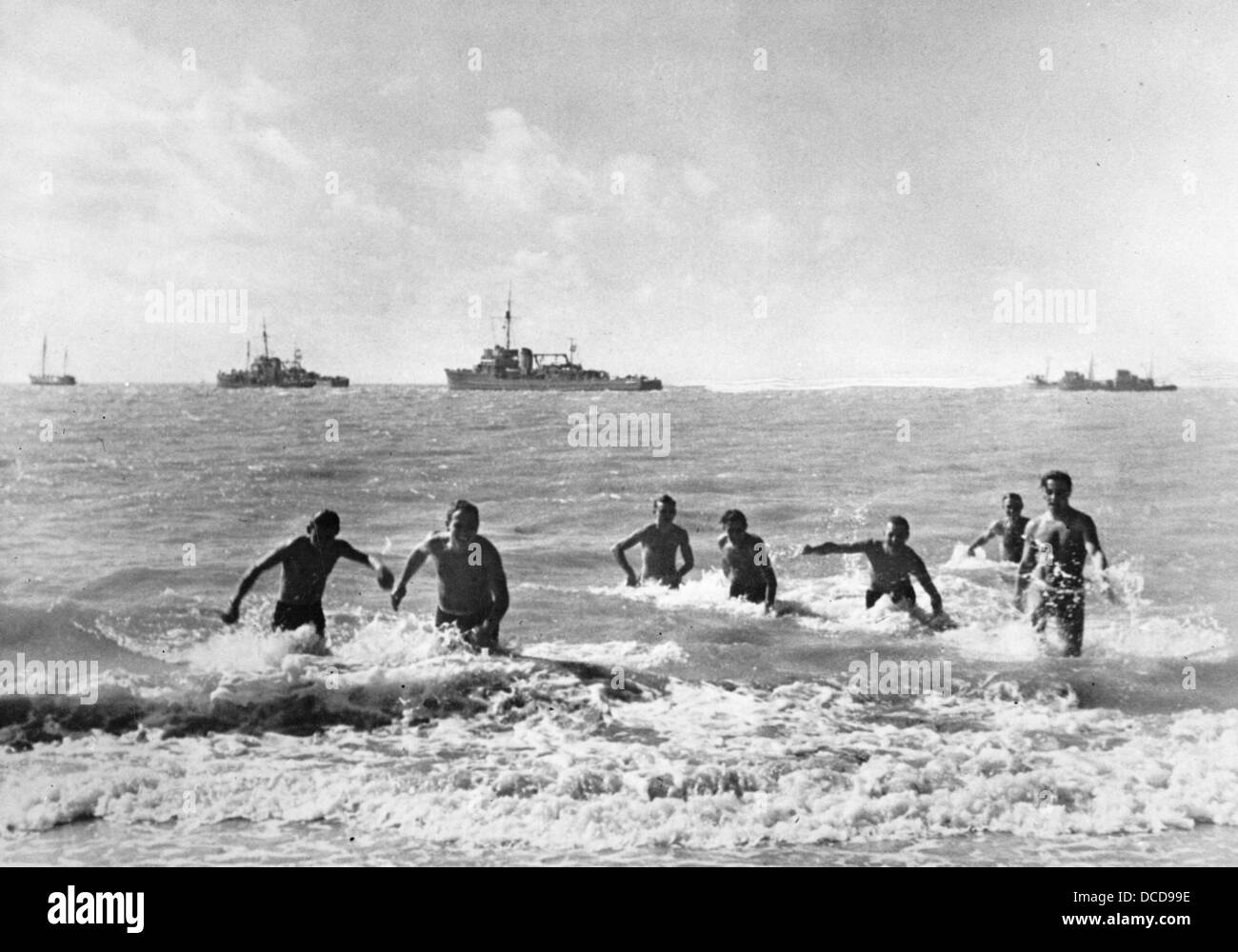 Soldiers of the German Wehrmacht swim in the Atlantic Ocean in 1942. Place unknown. Fotoarchiv für Zeitgeschichte Stock Photo