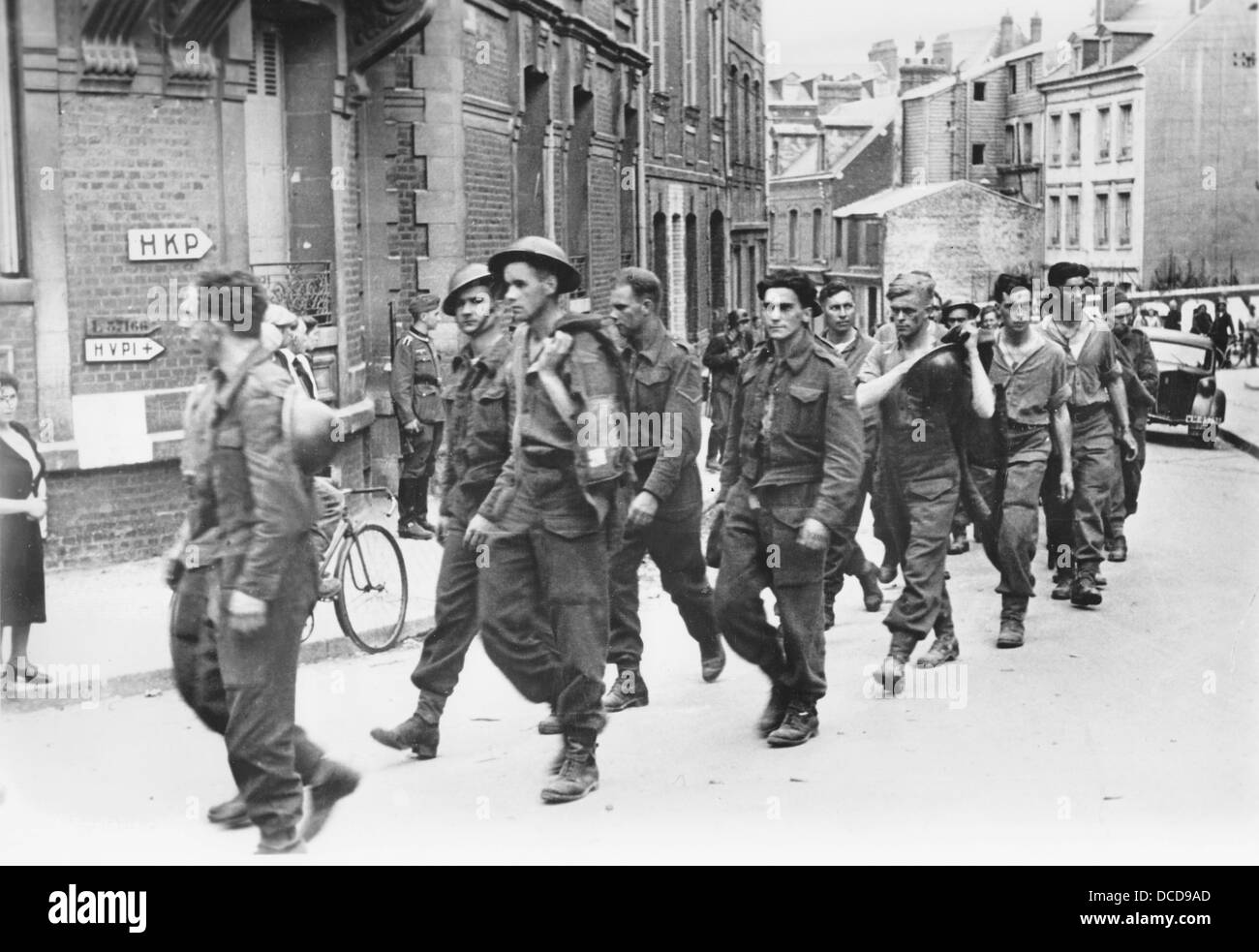 British soldiers who were taken prisoners of war by the German Wehrmacht are led through Dieppe in the occupied northern parts of France in August 1942. Fotoarchiv für Zeitgeschichte Stock Photo