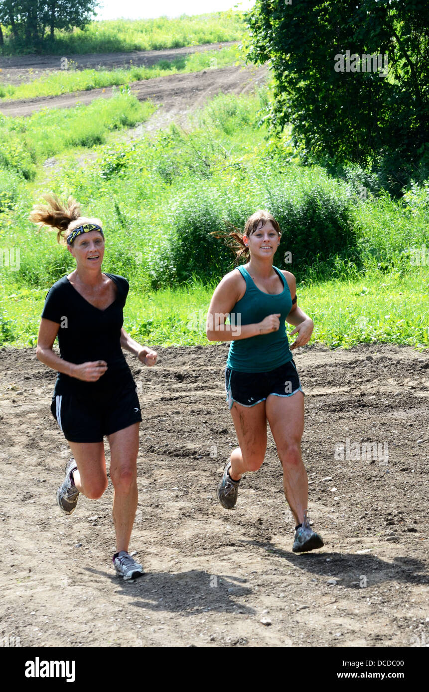 Two woman running 5K race. Stock Photo