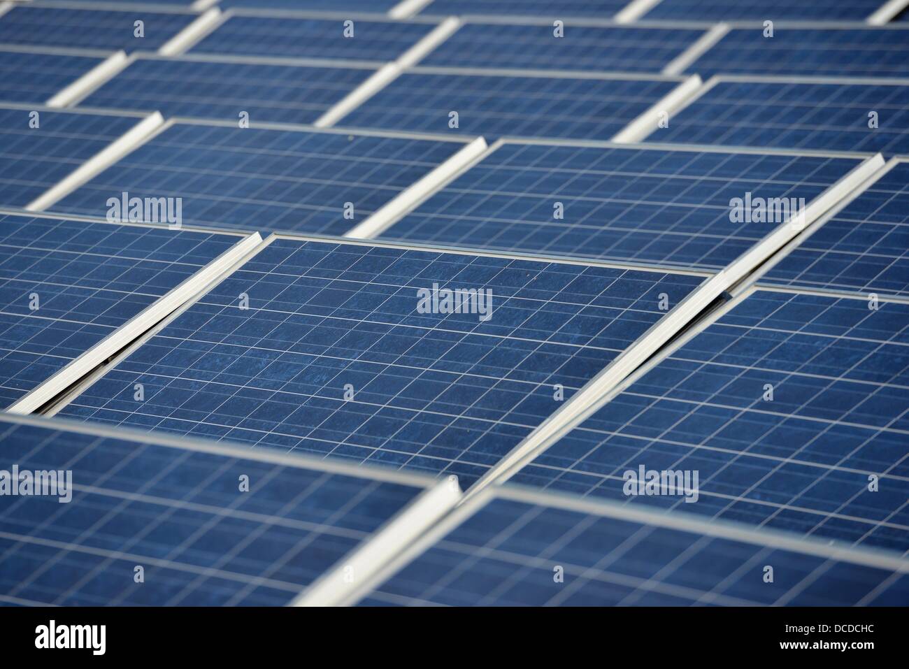 Solar panels of a solar energy plant are seen on a roof of a house in Osterode (central Germany) on 15 August 2013. Photo: Frank May Stock Photo