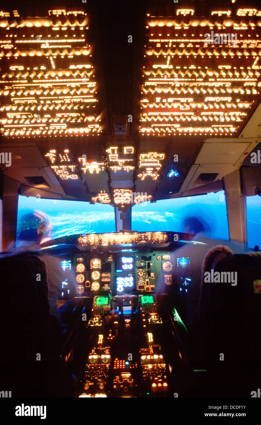 Interior view aircraft cockpit at night approaching runway Stock Photo -  Alamy