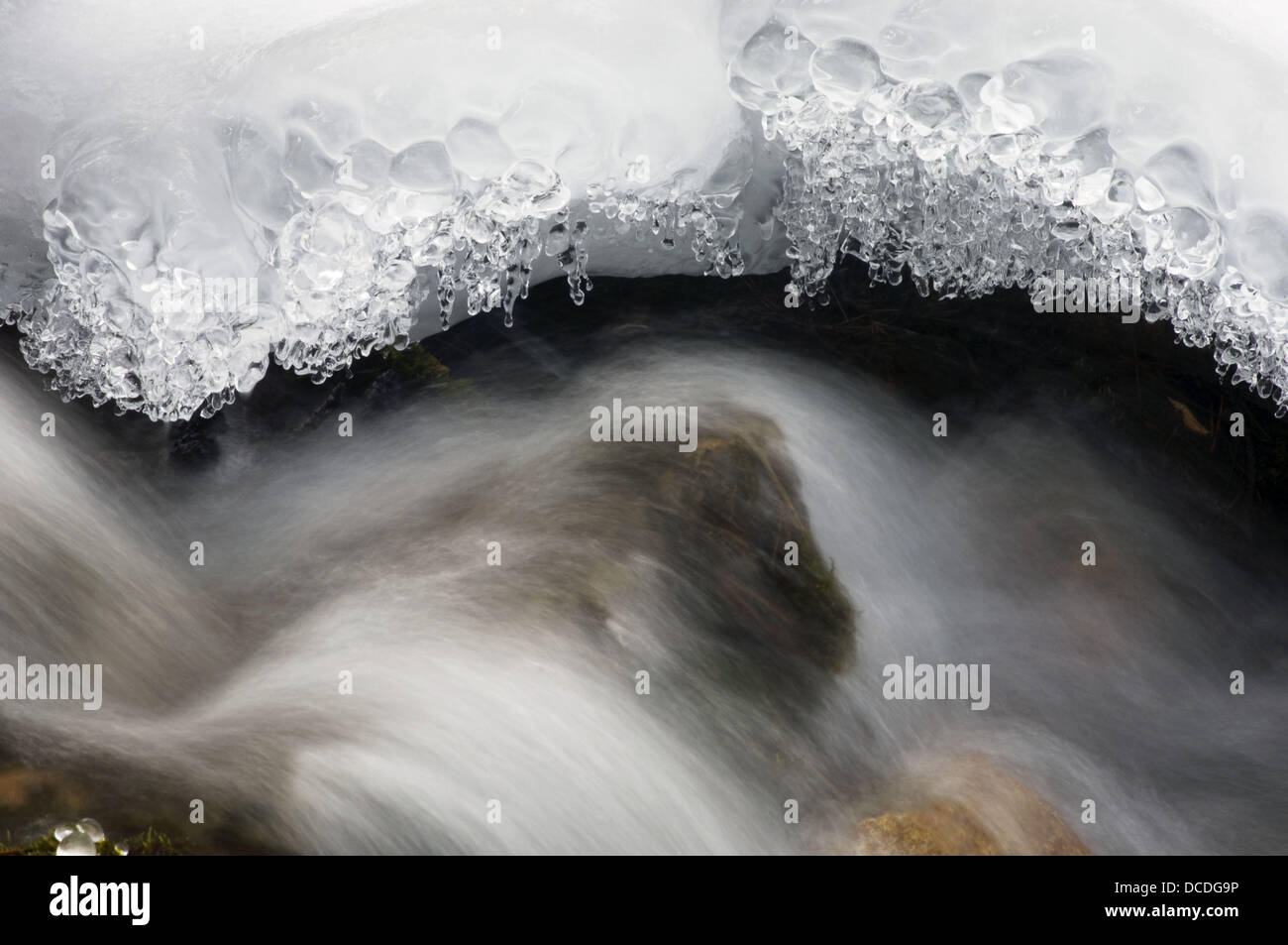 Ice formations and running water at O´Shaughnessy Creek. Alberta, Canada Stock Photo Alamy