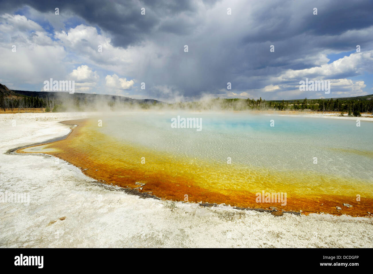 Sunset Lake with colourful algae and bacterial colonies, Black Sand Geyser Basin Stock Photo