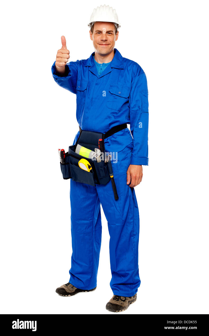Worker with tools bag showing thumbs up standing against white