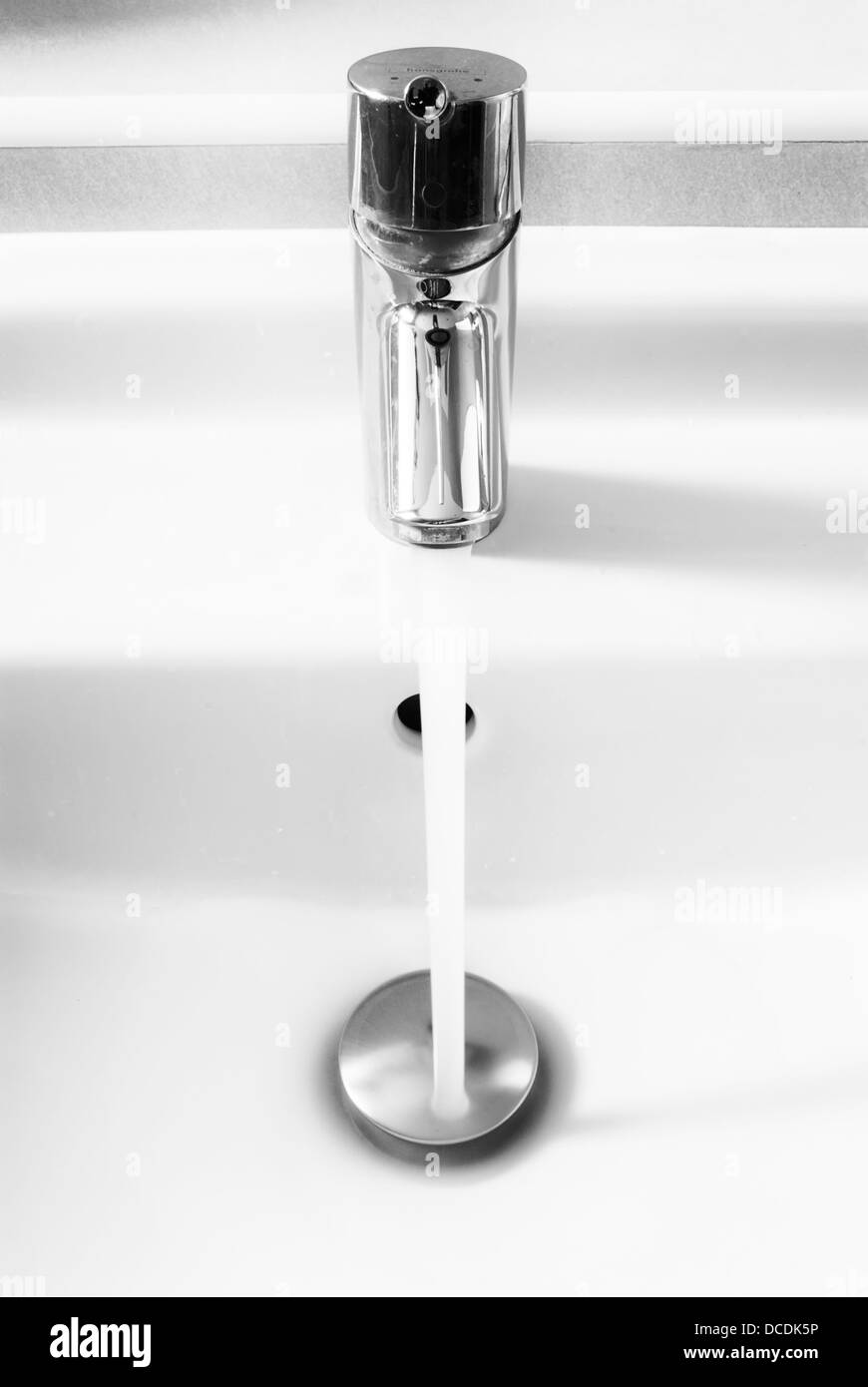 Bathroom tap with water Stock Photo