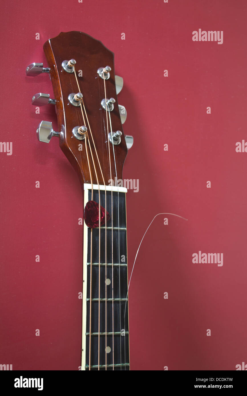 Broken Guitar string Stock Photo